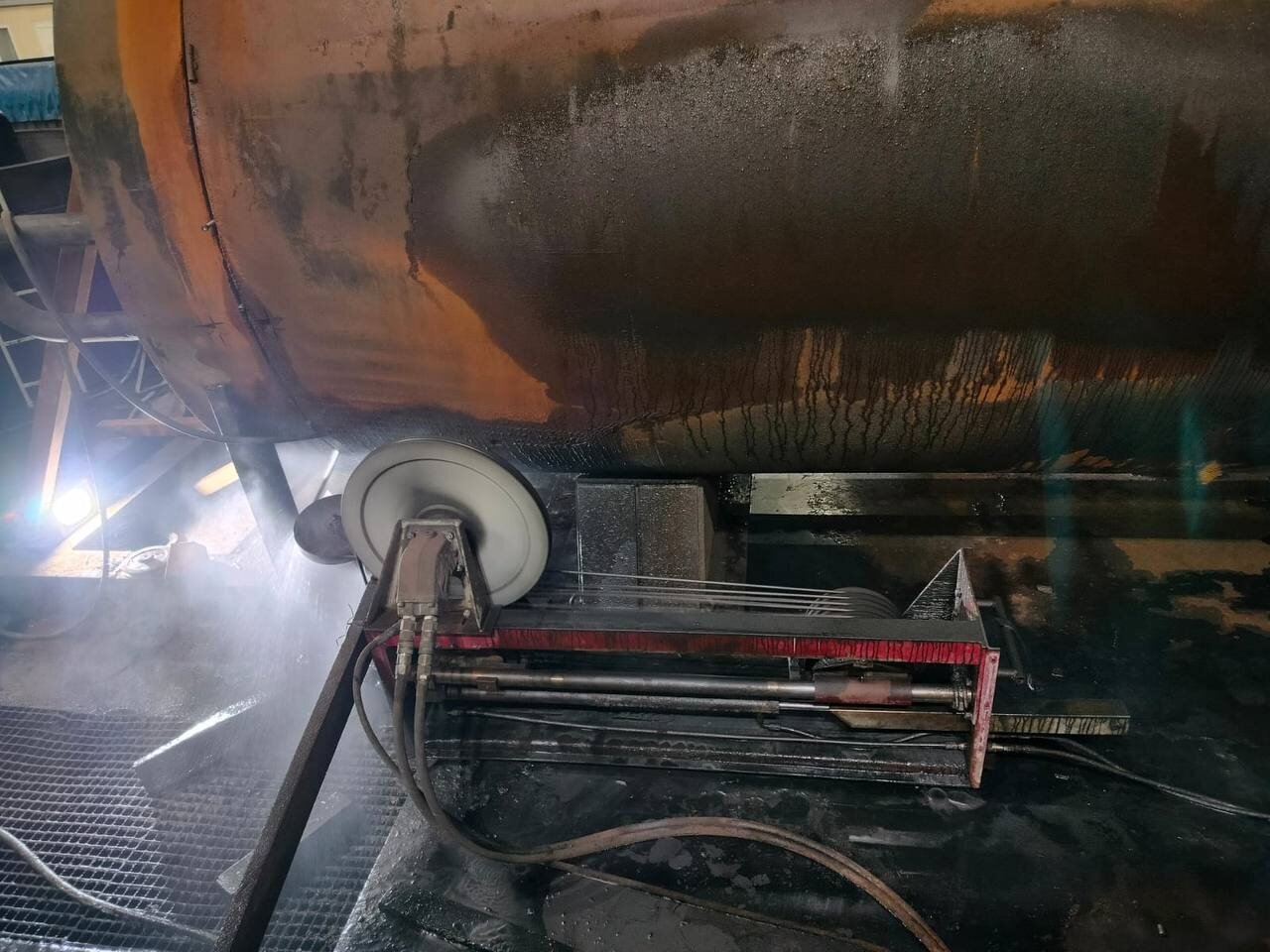 Diamond wire saw cutting a large industrial steel component