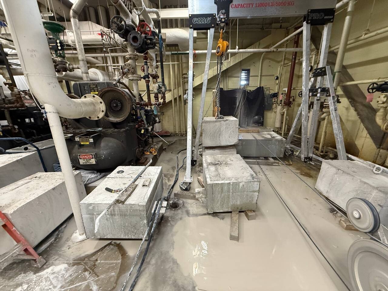 Diamond wire sawing setup around large reinforced-concrete equipment bases